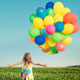 girl with colorful balloons
